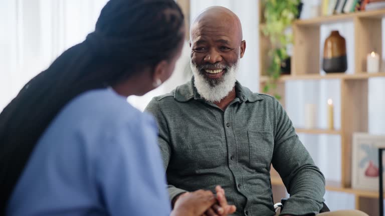A home health nurse with a patient